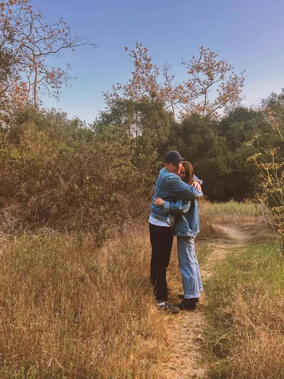 Cory G., the app's founder, sharing an embrace outdoors.